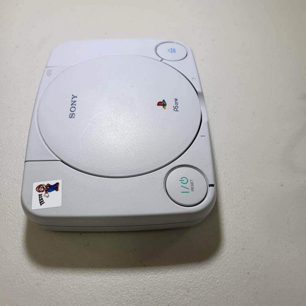 White Console PlayStation System PS1 Slim (Dualshock) -- Jeux Video Hobby 